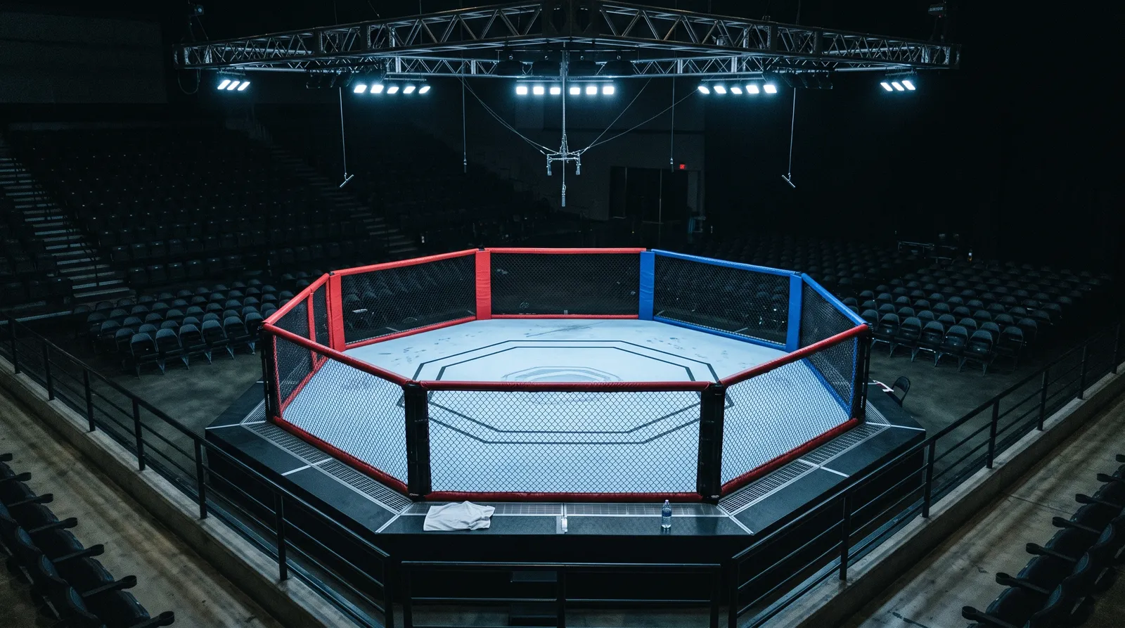 An empty octagon under work lights the day before a UFC fight night
